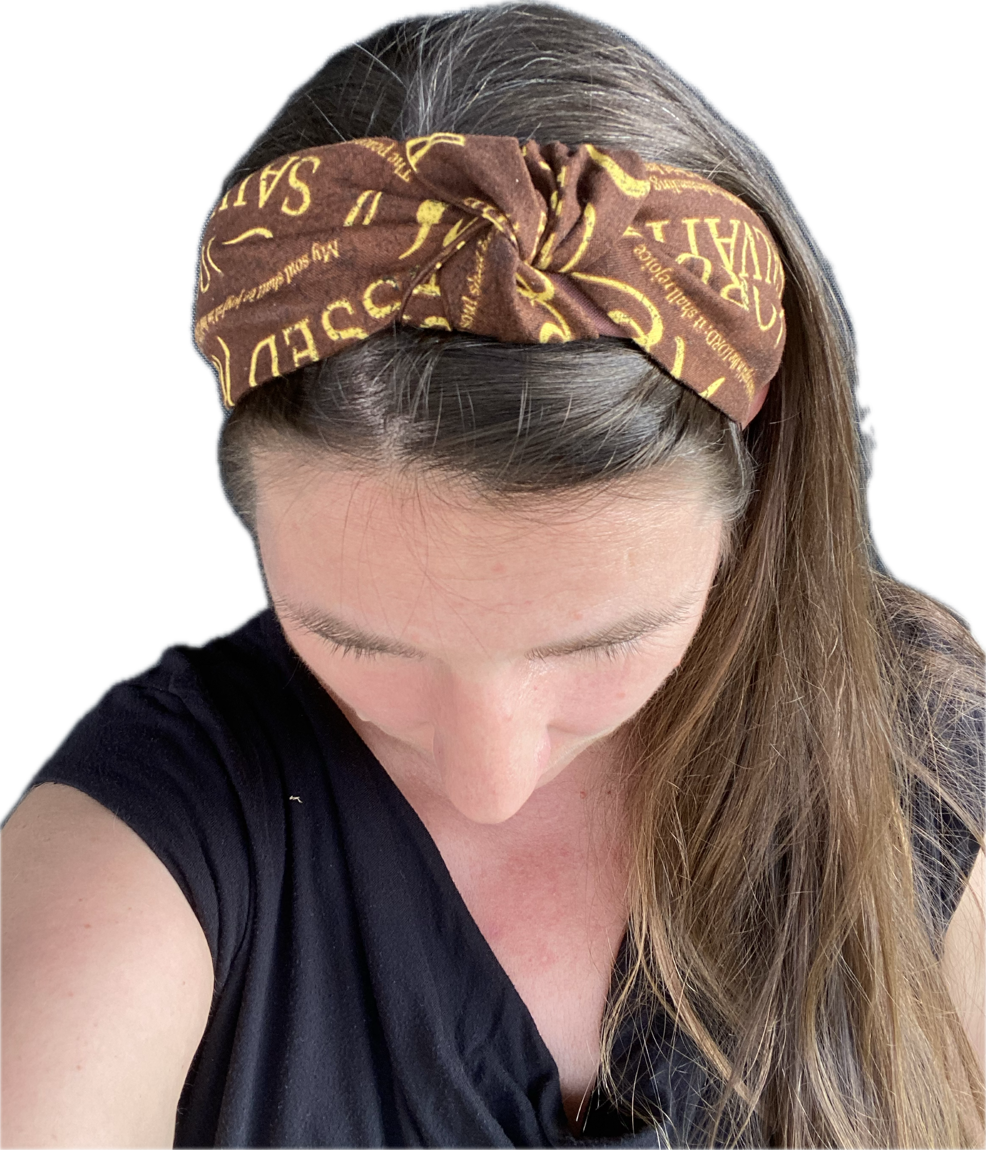 Knotted firm cotton, plastic shell headband in brown color with a religious pattern.